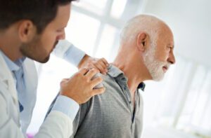 Patient being seen by doctor for Arthritis in the Shoulder.